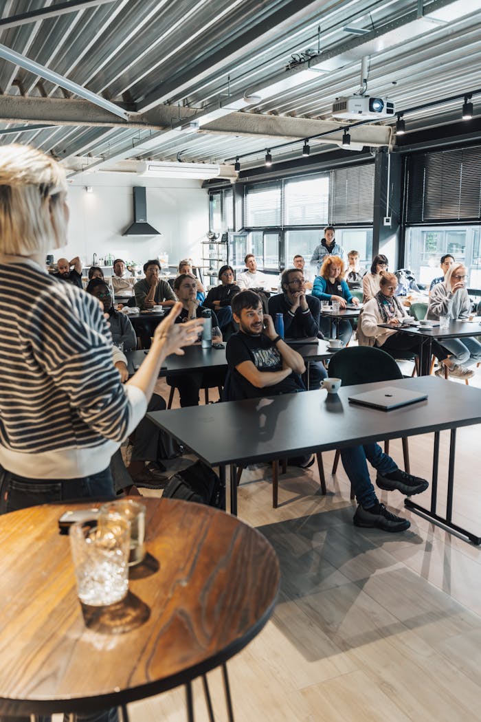 Woman Speaking during Workshop in a Hall